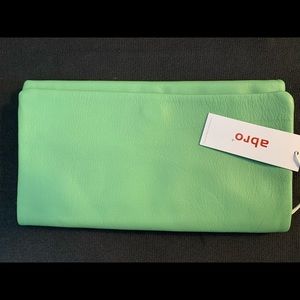 Beautiful green clutch purse.  Extensive space.